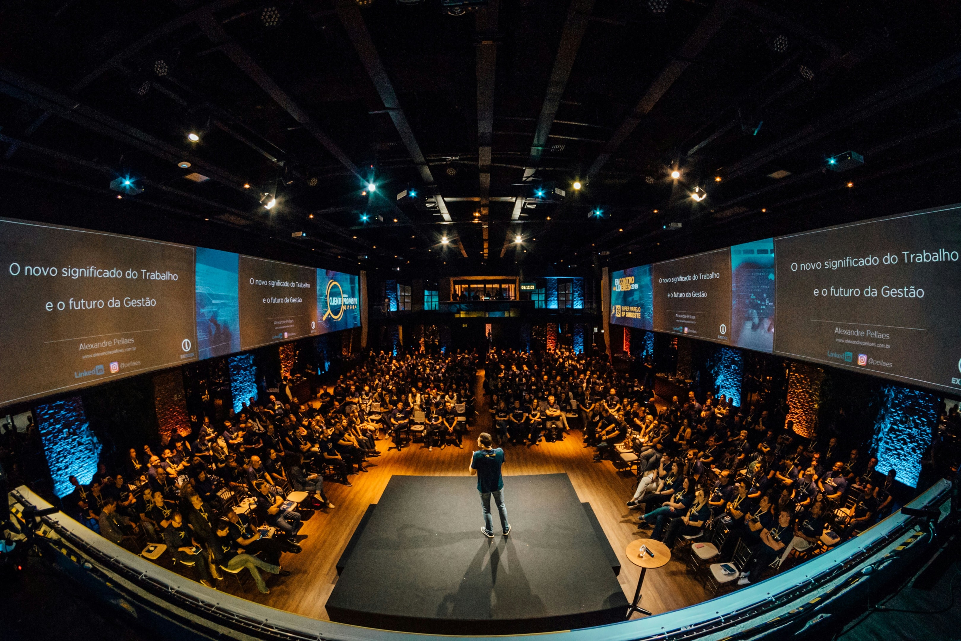 Attendees at the World Economic Forum participate in a panel discussion, similar to Dreamforce's interactive sessions.